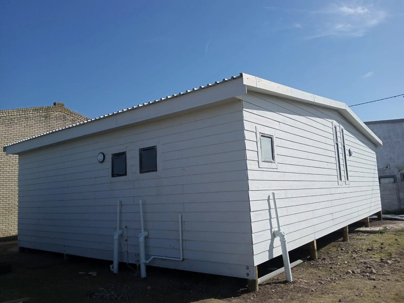 Completed fibre-cement structure