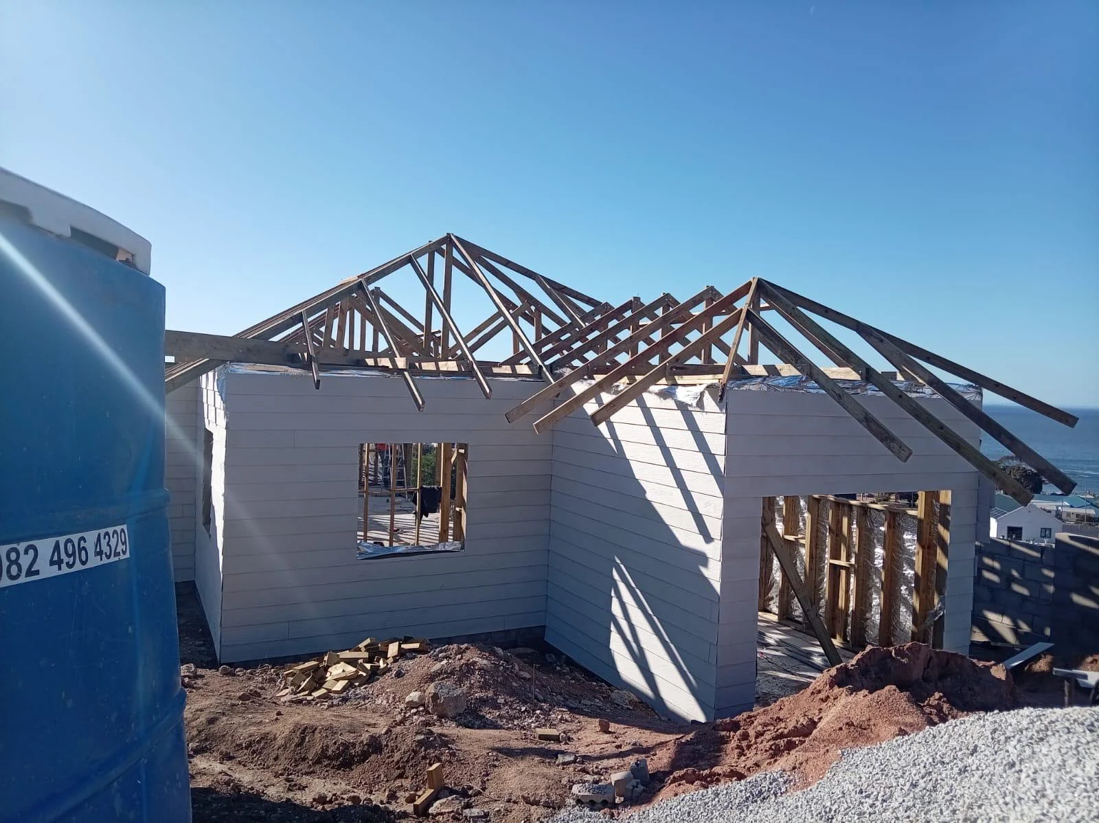Roof truss installation in progress