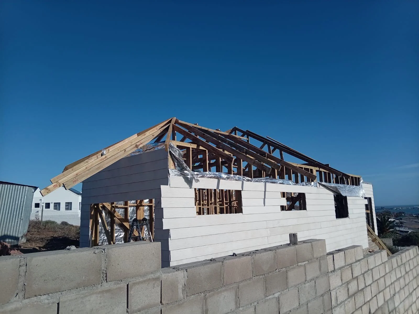 Roof truss and cladding construction stage