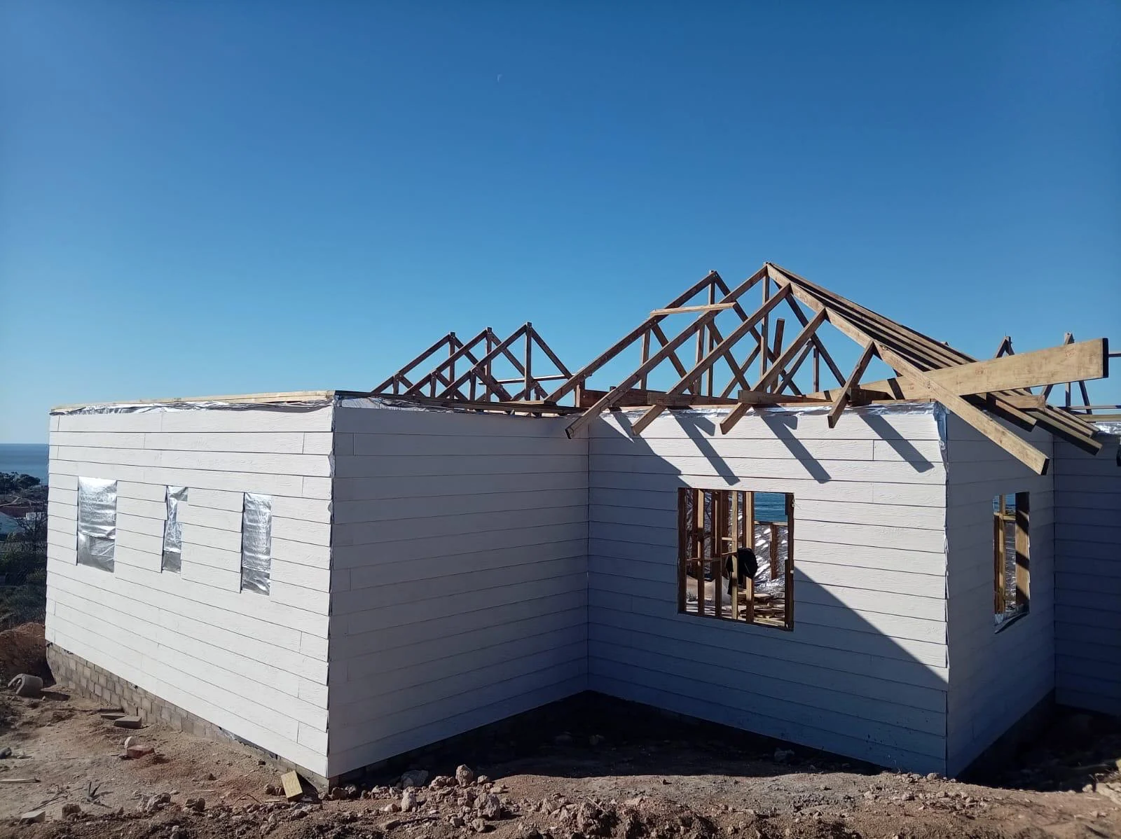 Fibre-cement wall cladding and roof trusses in progress
